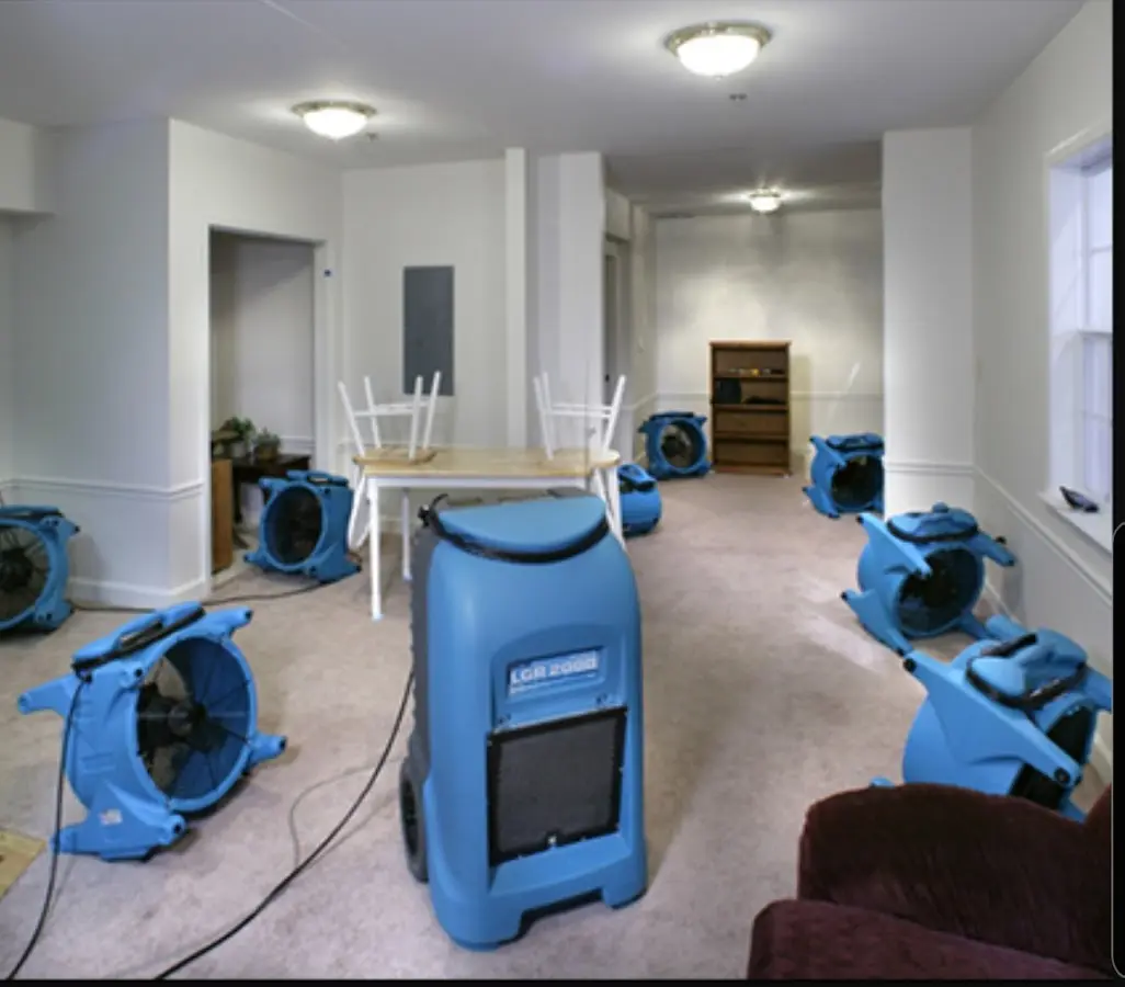 Air movers and dehumidifier setup for Water Damage Restoration in Naples Manor